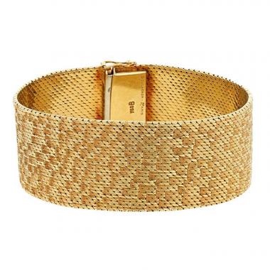 Bracelet manchette années 70 semi-souple Boucheron  en or jaune
