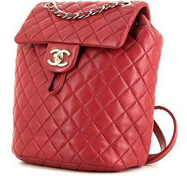 Sac à dos Chanel Timeless en cuir matelassé rose-framboise